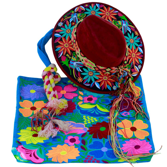 Red floral hat with blue bag